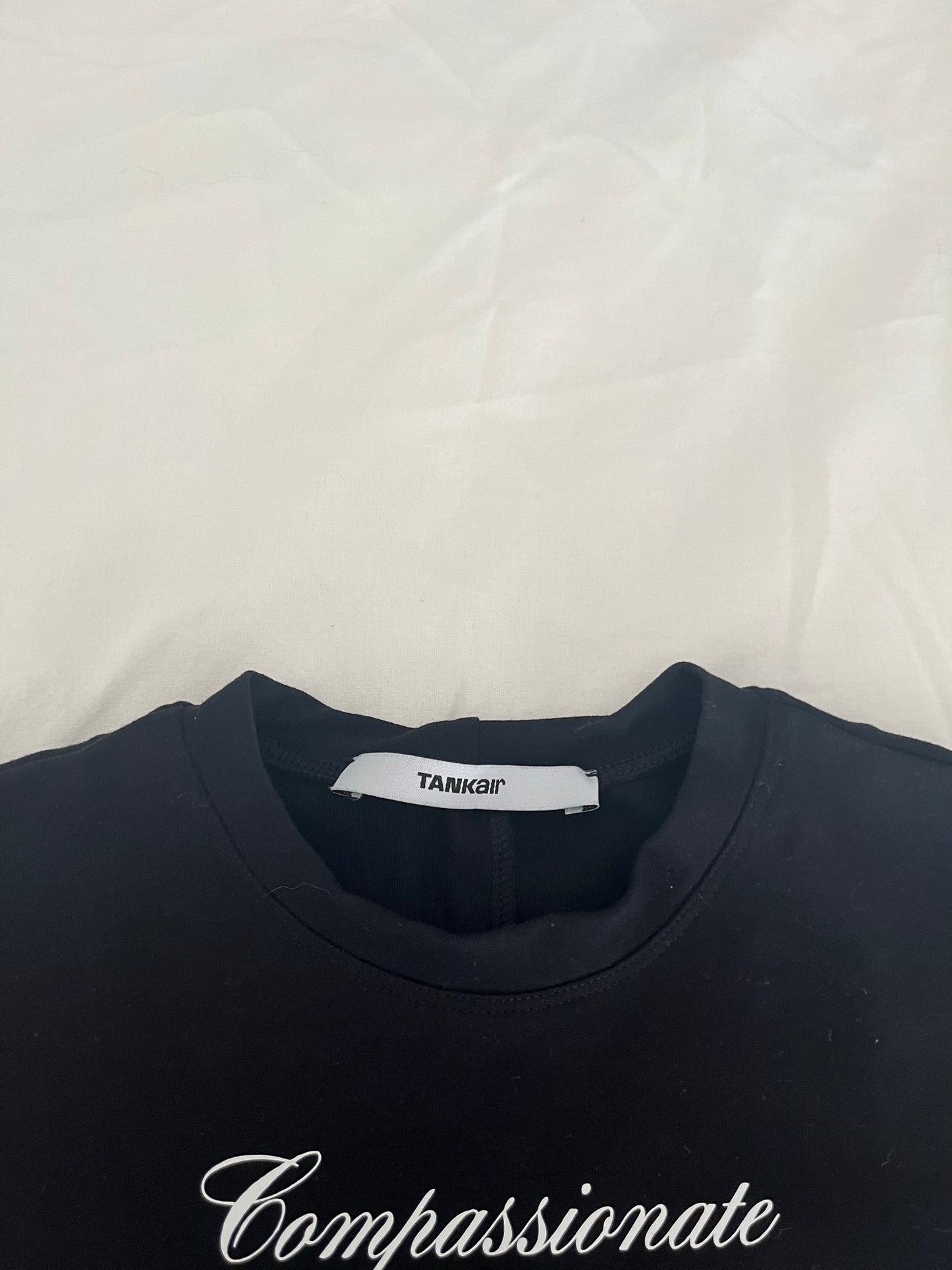 Tank Air Compassionate Baby Tee
